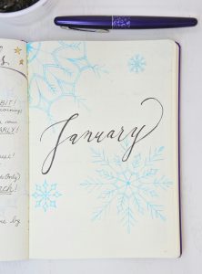 drawing of snowflakes and the word January