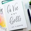 French hand-lettered quote" Life is beautiful " . Hand lettered Bullet journal quote.