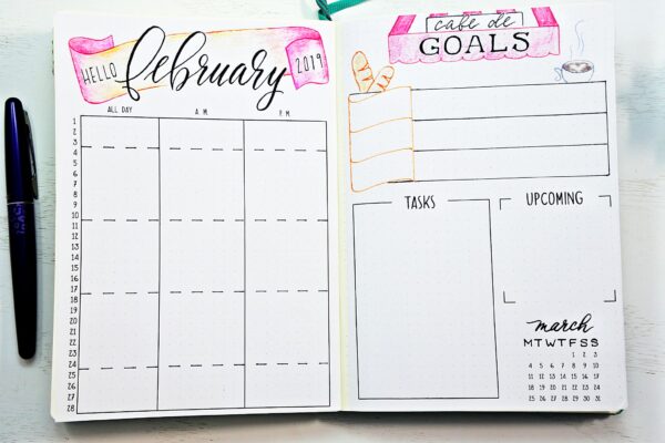 Printable February bullet journal setup with monthly calendar and goals worksheet.