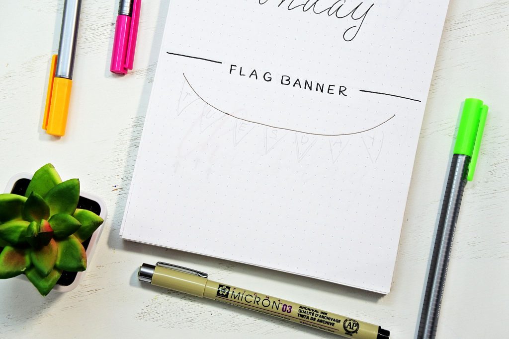 Tutorial for creating a flag banner plus dozens more bullet journal fonts.