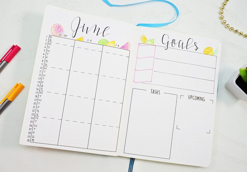 June 2021 calendar and goals bullet journal spread.