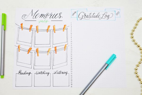 Printable july bullet journal spreads for tracking memories and gratitude.