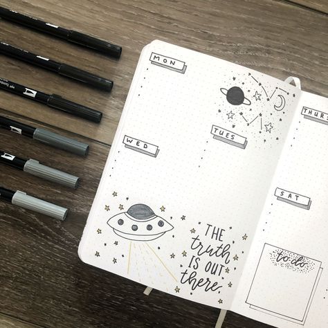 space themed bullet journal weekly spread
